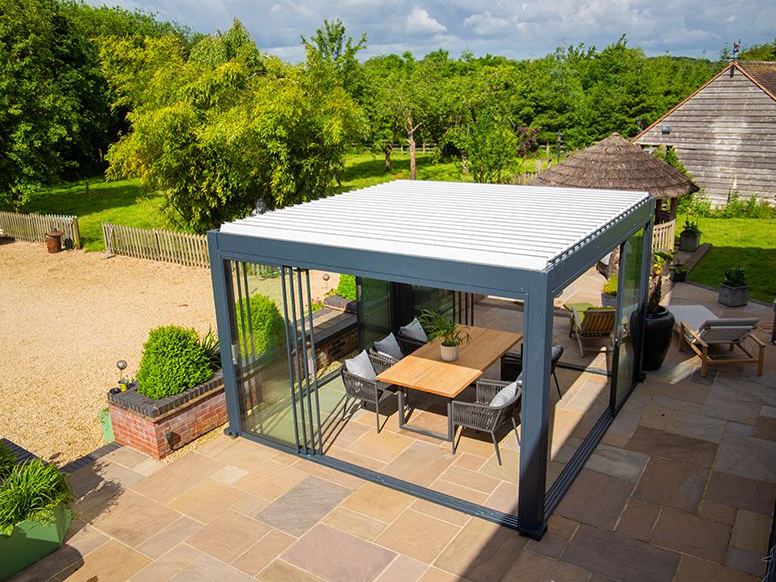 Mirage 3 x 3m bioclimatic pergola with louvred roof and glass sliding doors
