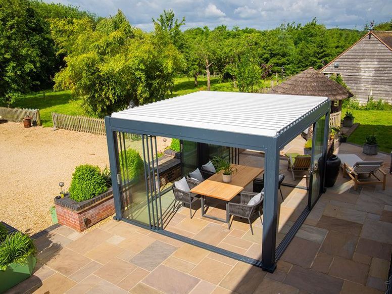 Mirage 3 x 3m bioclimatic pergola with louvred roof and glass sliding doors
