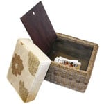 The footstool has a storage compartment as well