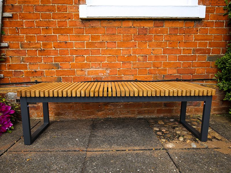 backless metal outdoor bench