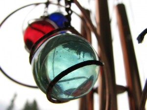 wind chimes can cause damage to your garden in high winds
