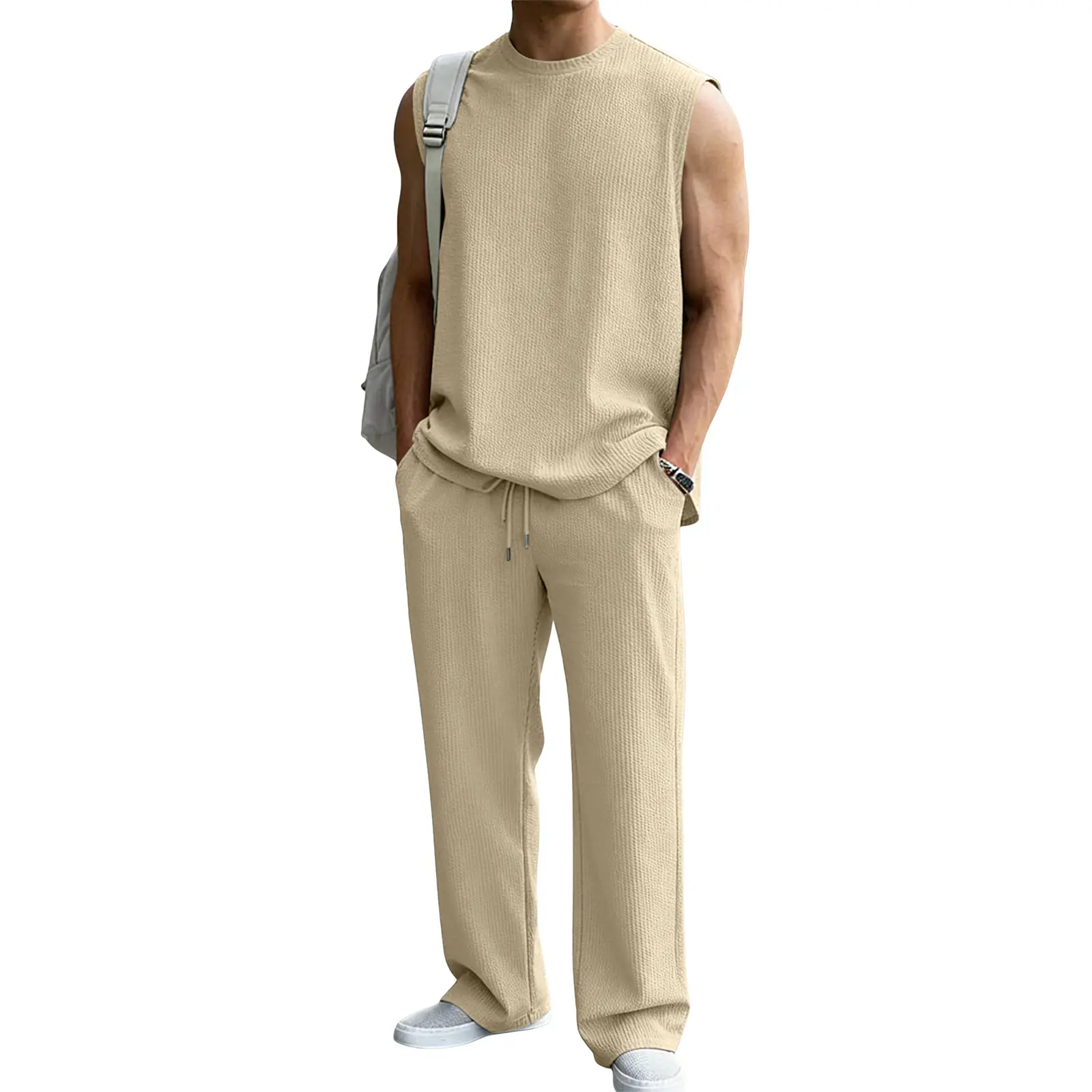 Men's two-piece ribbed knit sportswear set – a summer combination of a sleeveless vest and loose wide-leg trousers, perfect for men's vacation and beach wear.