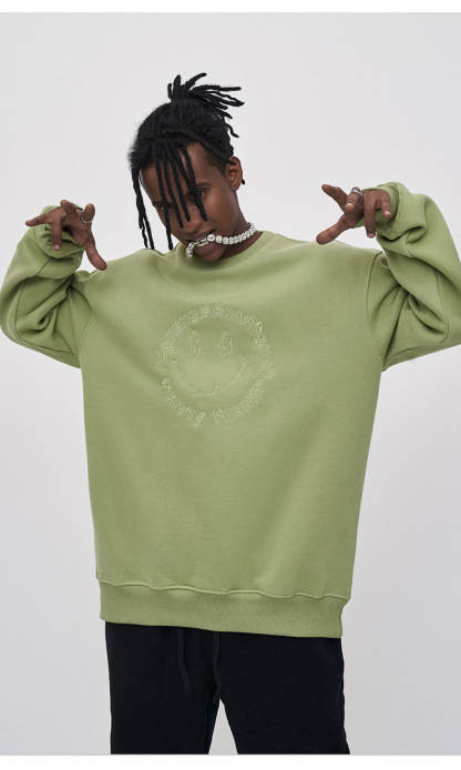 Embroidered smiley face sweatshirt