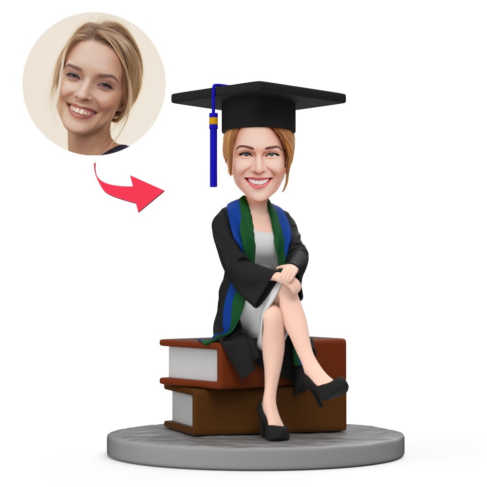 Female Graduate Sitting on a Book Custom Bobblehead with Engraved Text - MyFaceBobbleheads