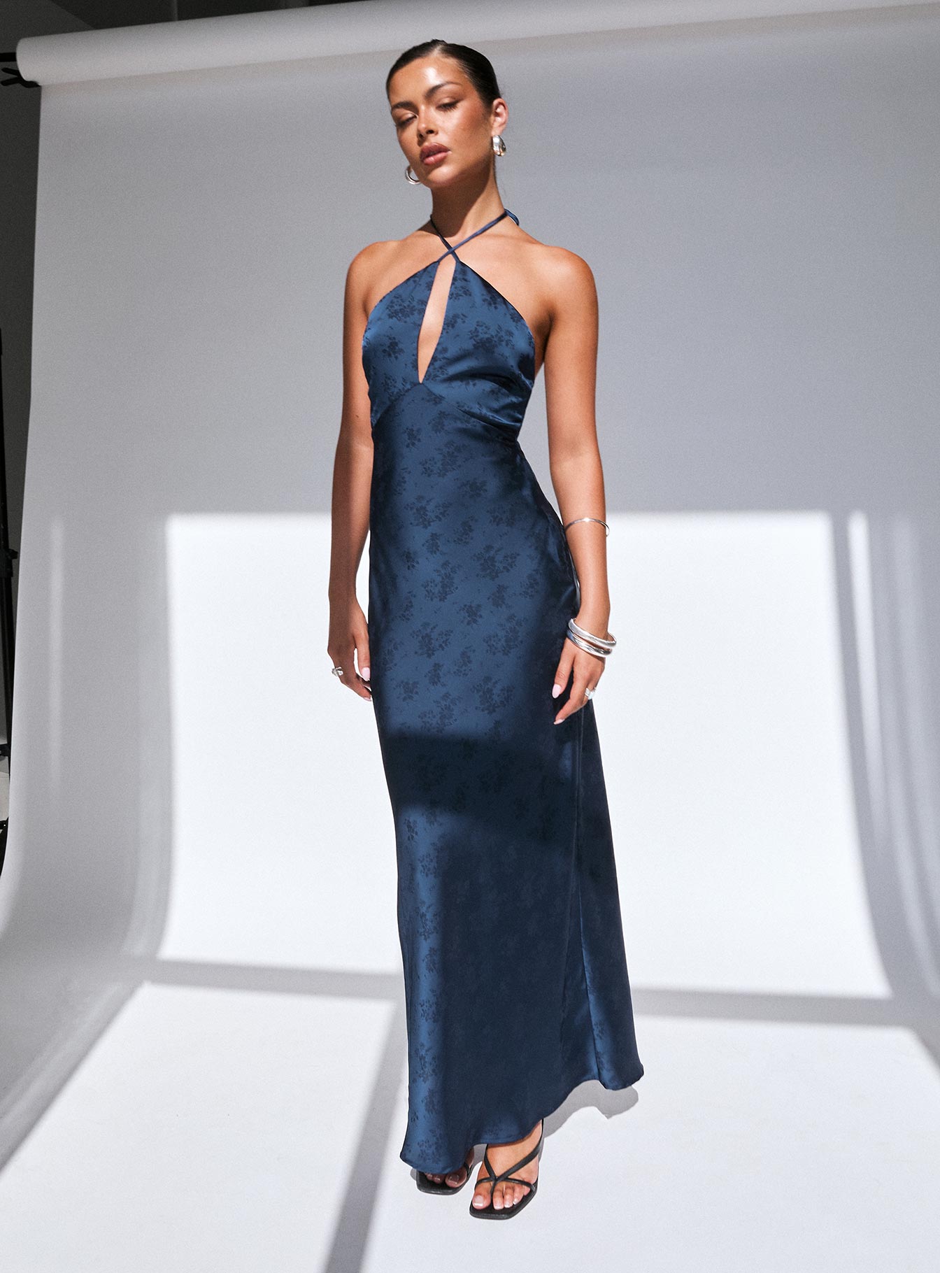 front view of model wearing Princess Polly Limosina Halter Maxi Dress Navy Plunger