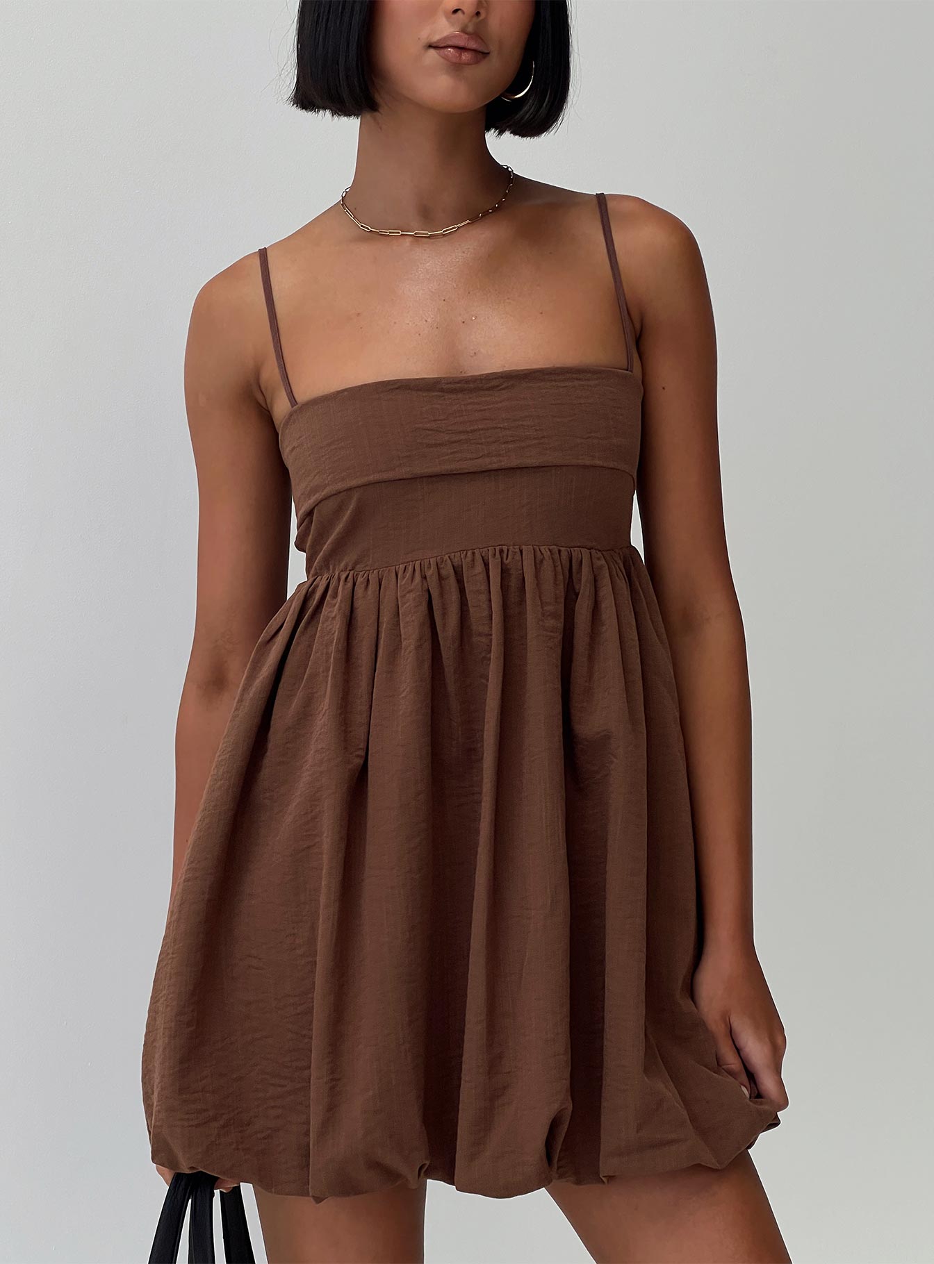 front view of model wearing Princess Polly Layken Bubble Hem Mini Dress Chocolate Tall Square Neck