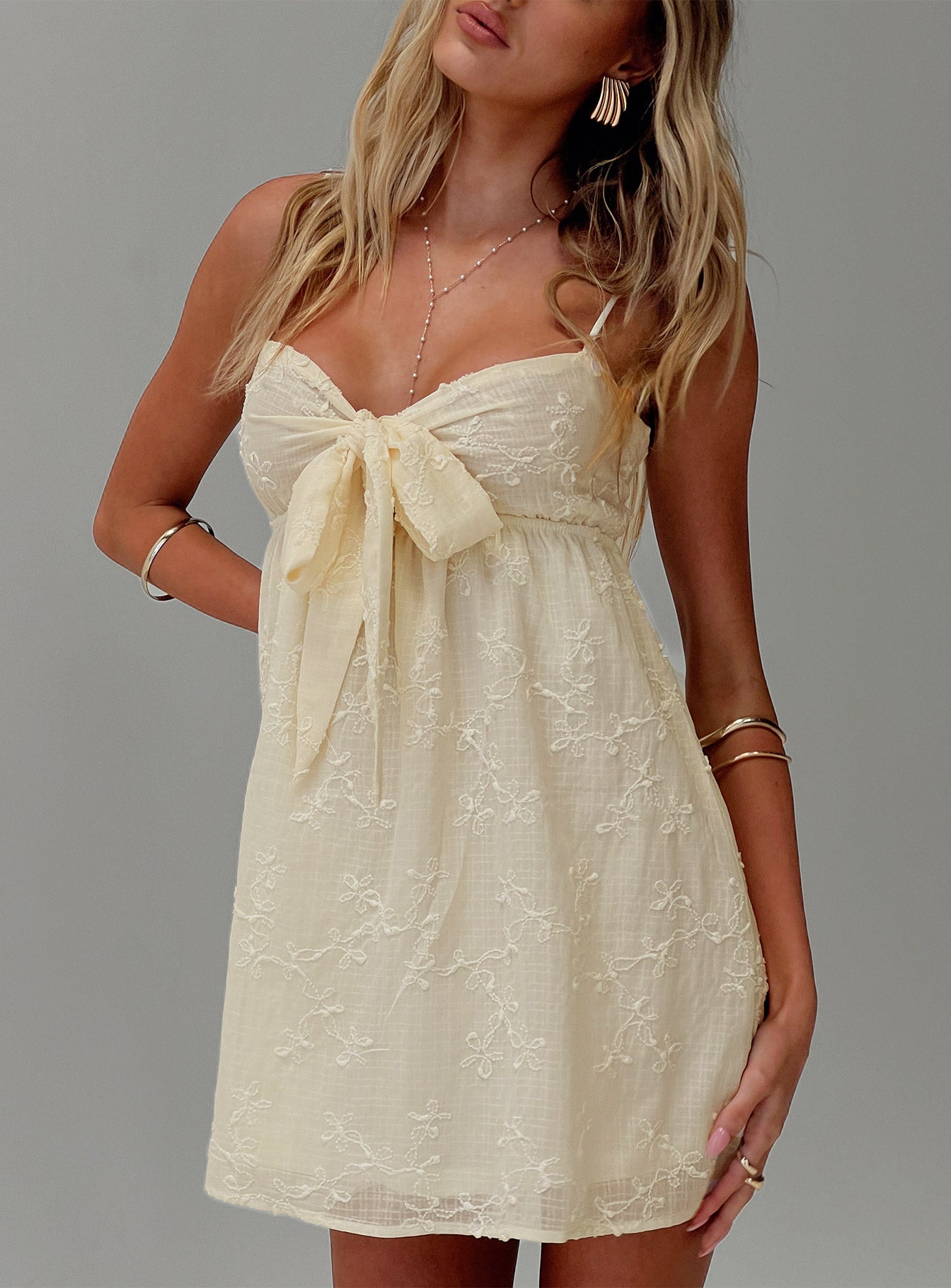 front view of model wearing Princess Polly Granno Mini Dress Lemon Sweetheart Neckline