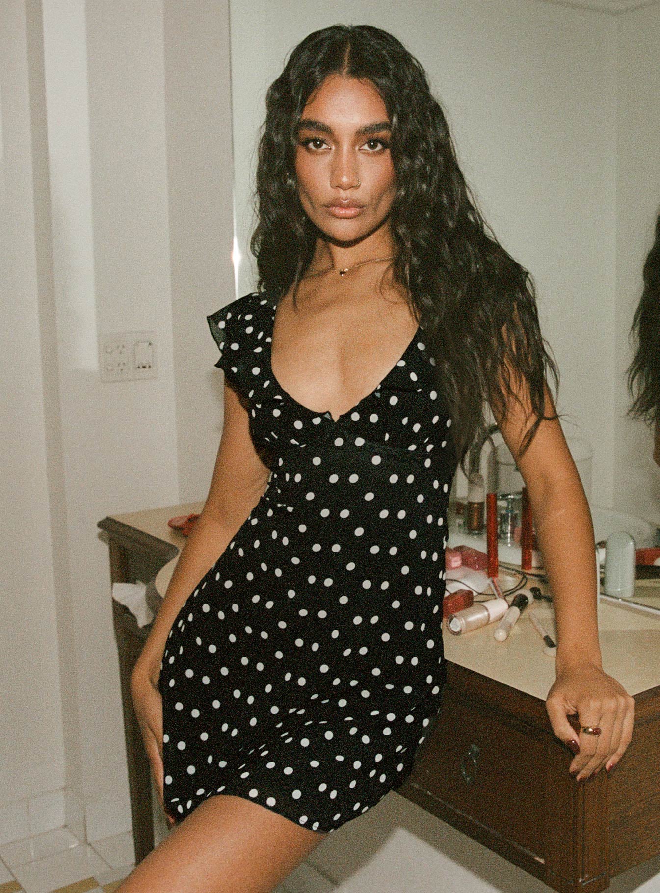 front view of model wearing Princess Polly I Guess So Mini Dress Black Polka Dot V-Neck