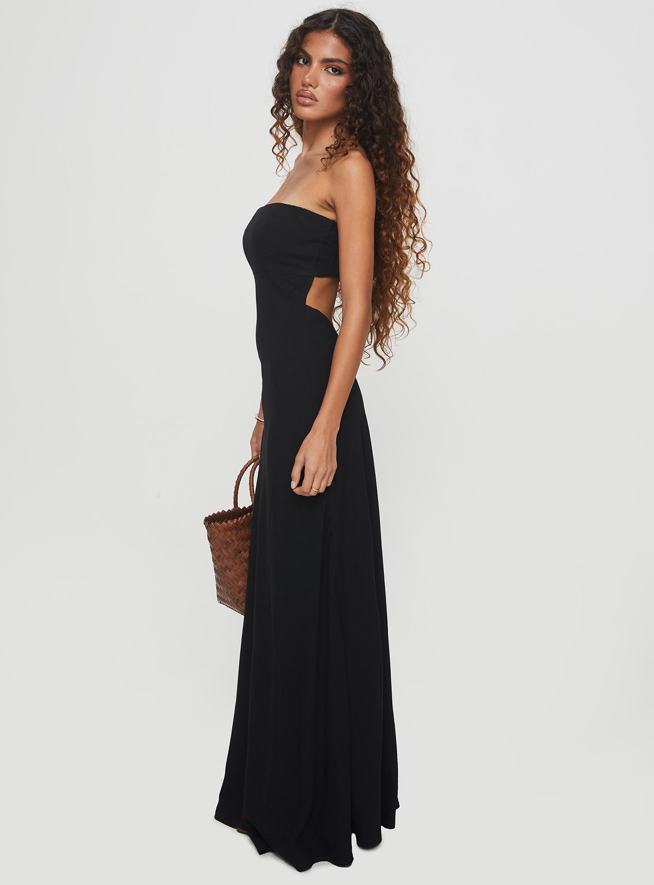 side view of model wearing Princess Polly Yahir Strapless Maxi Dress Black Straight Neck