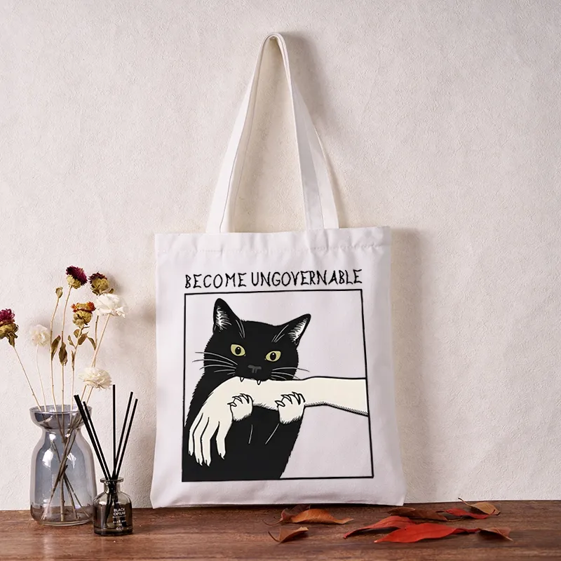 Tokyo-Tiger Black Cat Biting Tote Bag