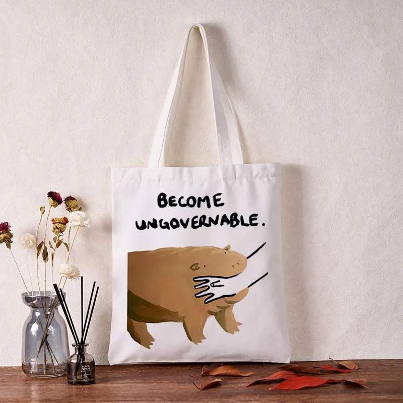 Tokyo-Tiger Moo Deng Bites Someone's Arm Tote Bag