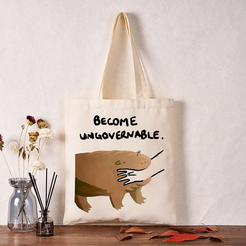 Tokyo-Tiger Moo Deng Bites Someone's Arm Tote Bag