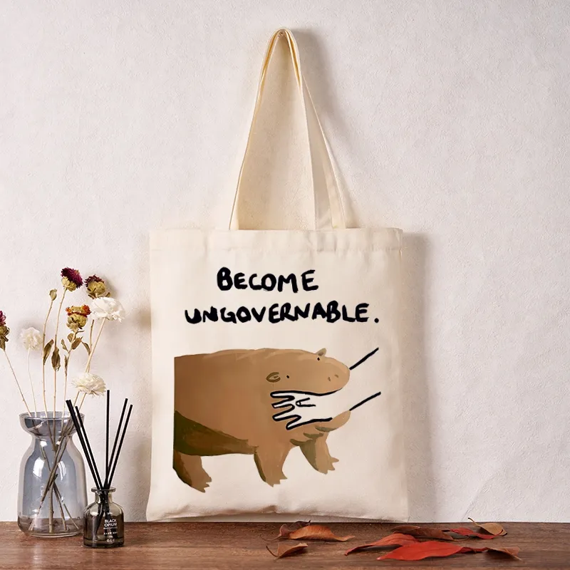 Tokyo-Tiger Moo Deng Bites Someone's Arm Tote Bag