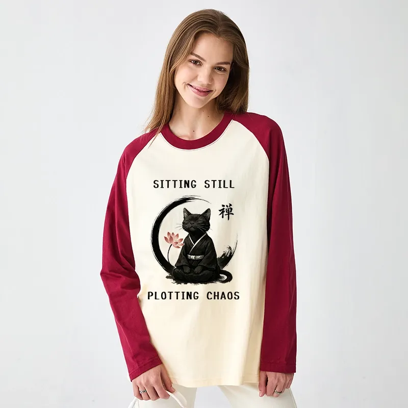 Tokyo-Tiger Sitting still  plotting chaos Calming Zen Cat Funny Raglan Long Sleeve T-shirt