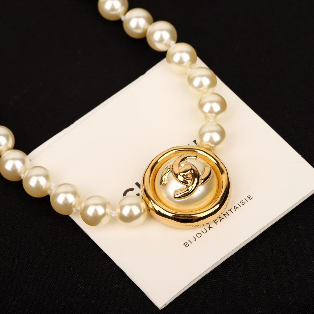Buy replica Chanel Enhancer Double C Pendant Pearl Choker Necklace and replica jewelry from PICKS Jewelry