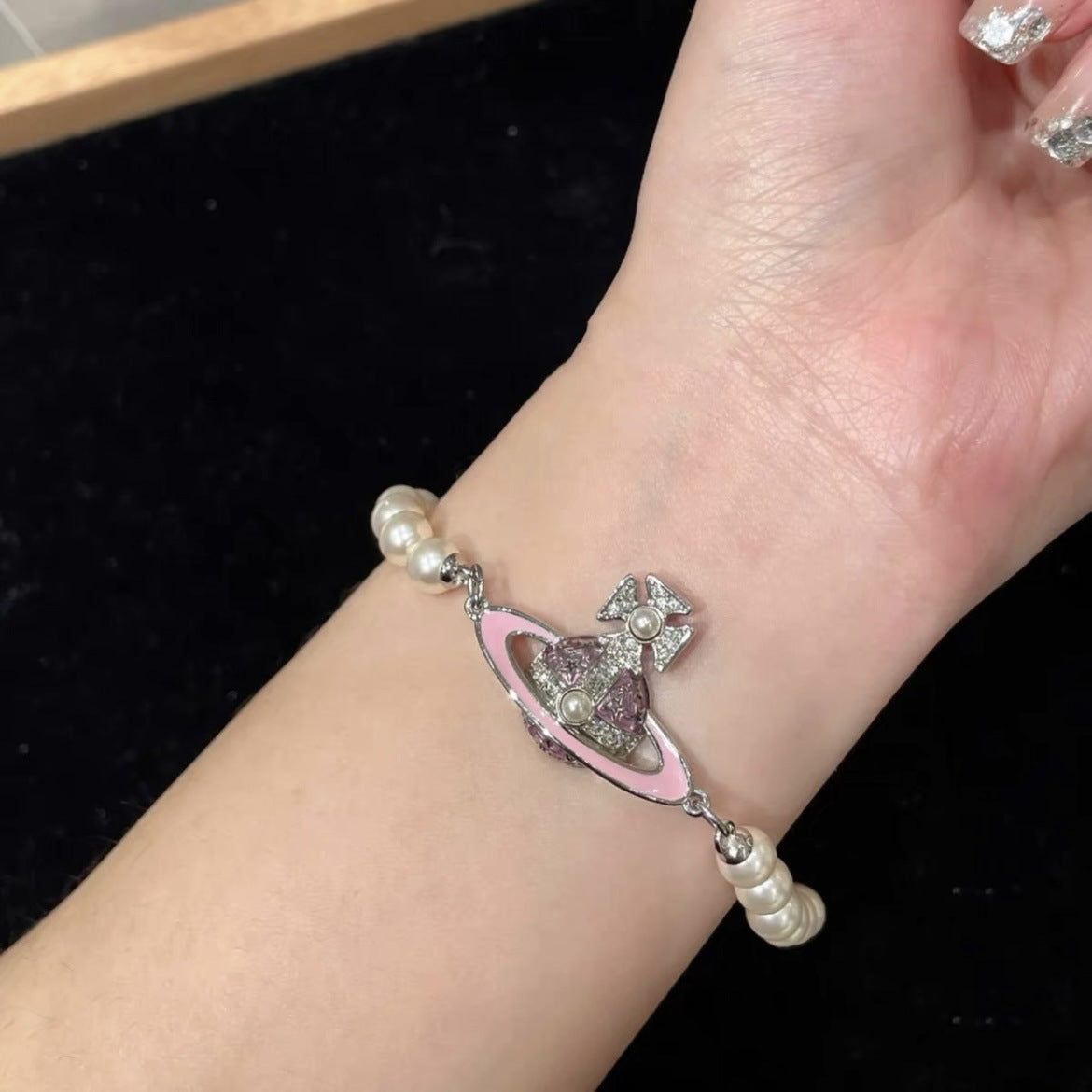 Buy replica Vivienne Westwood Enamel Diamond Saturn Bracelet and replica jewelry from PICKS Jewelry