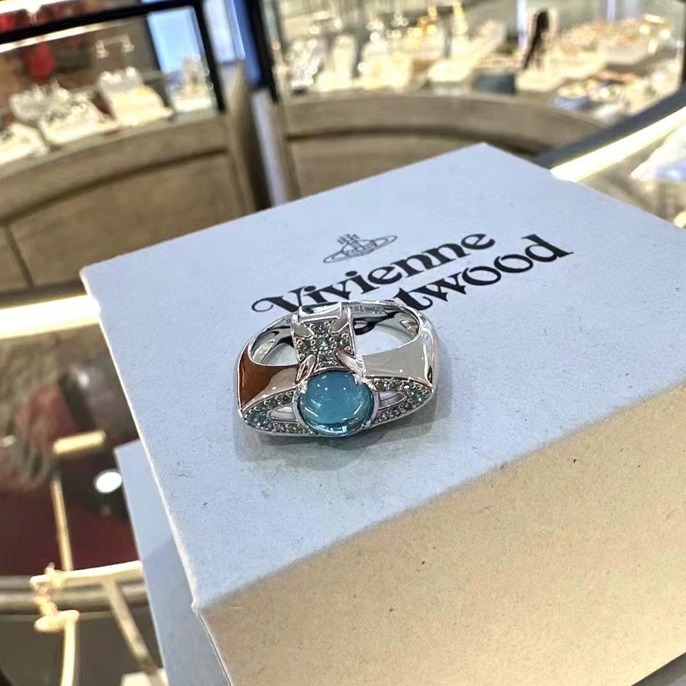 Buy replica Vivienne Westwood Lake Blue Lucky Bead Saturn Ring and replica jewelry from PICKS Jewelry