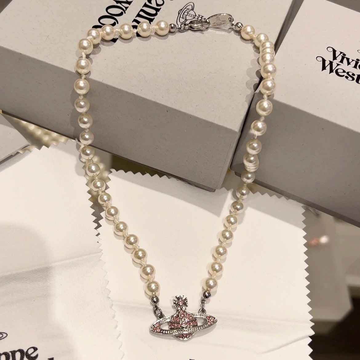 Buy replica Vivienne Westwood Pink Saturn Necklace and replica jewelry from PICKS Jewelry