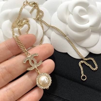 Buy replica Chanel Minimalist Double C Pearl Drop Necklace and replica jewelry from PICKS Jewelry
