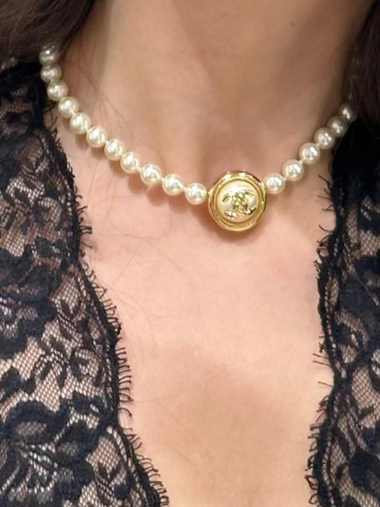 Buy replica Chanel Enhancer Double C Pendant Pearl Choker Necklace and replica jewelry from PICKS Jewelry