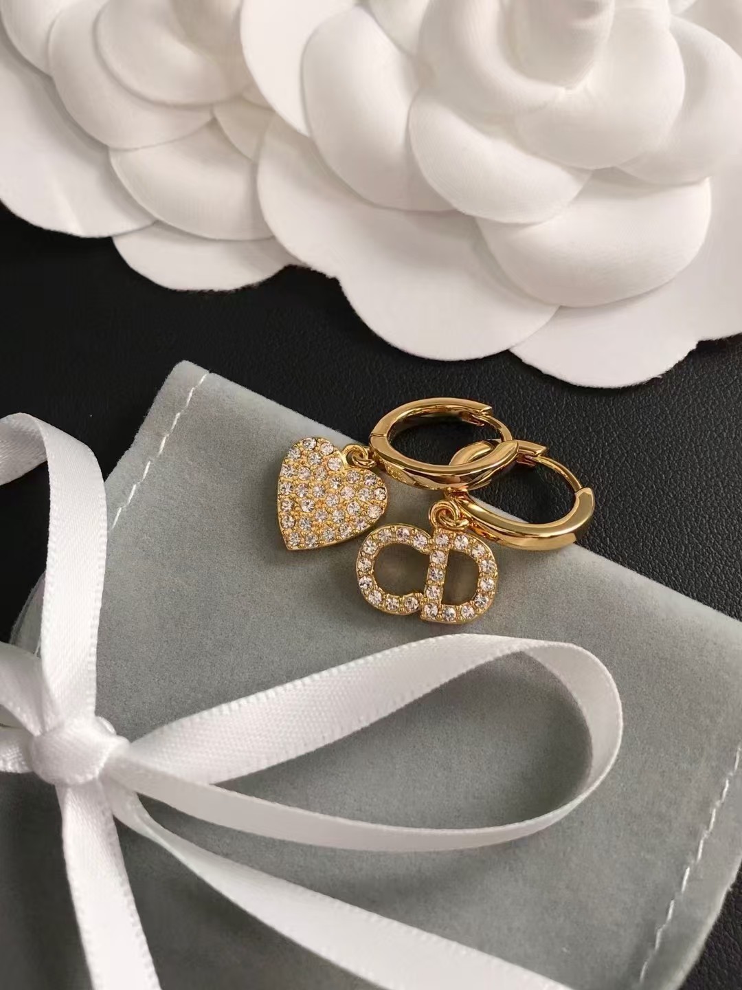 Buy replica Dior Asymmetric Heart CD Dangle Earrings and replica jewelry from PICKS Jewelry