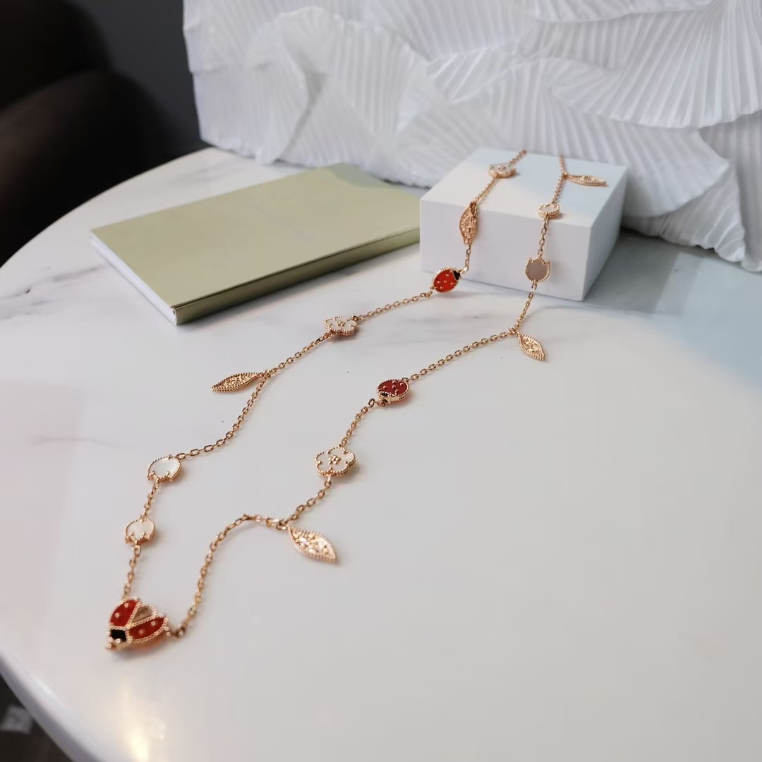 Buy replica Van Cleef & Arpels Lucky Spring Long Necklace, 15 Motifs and replica jewelry from PICKS Jewelry