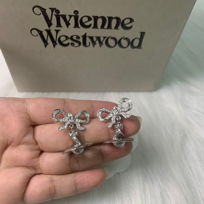 Buy replica Vivienne Westwood Bowknot Crystal Saturn Earrings and replica jewelry from PICKS Jewelry