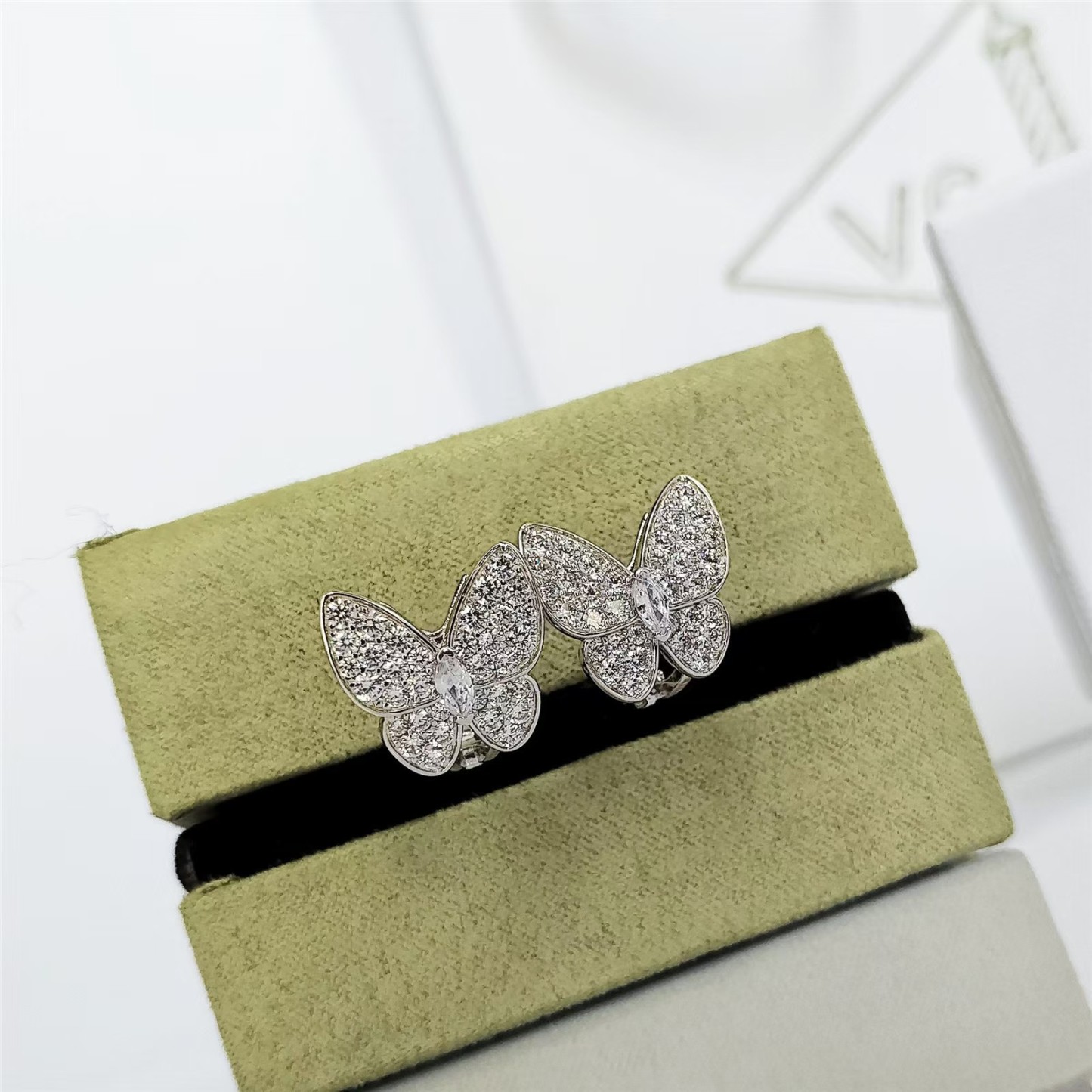 Buy replica Van Cleef & Arpels Two Butterfly Earrings and replica jewelry from PICKS Jewelry