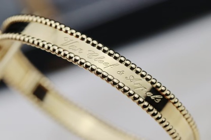 Buy replica Van Cleef & Arpels Perlée Signature Bracelet - Medium Bangle and replica jewelry from PICKS Jewelry