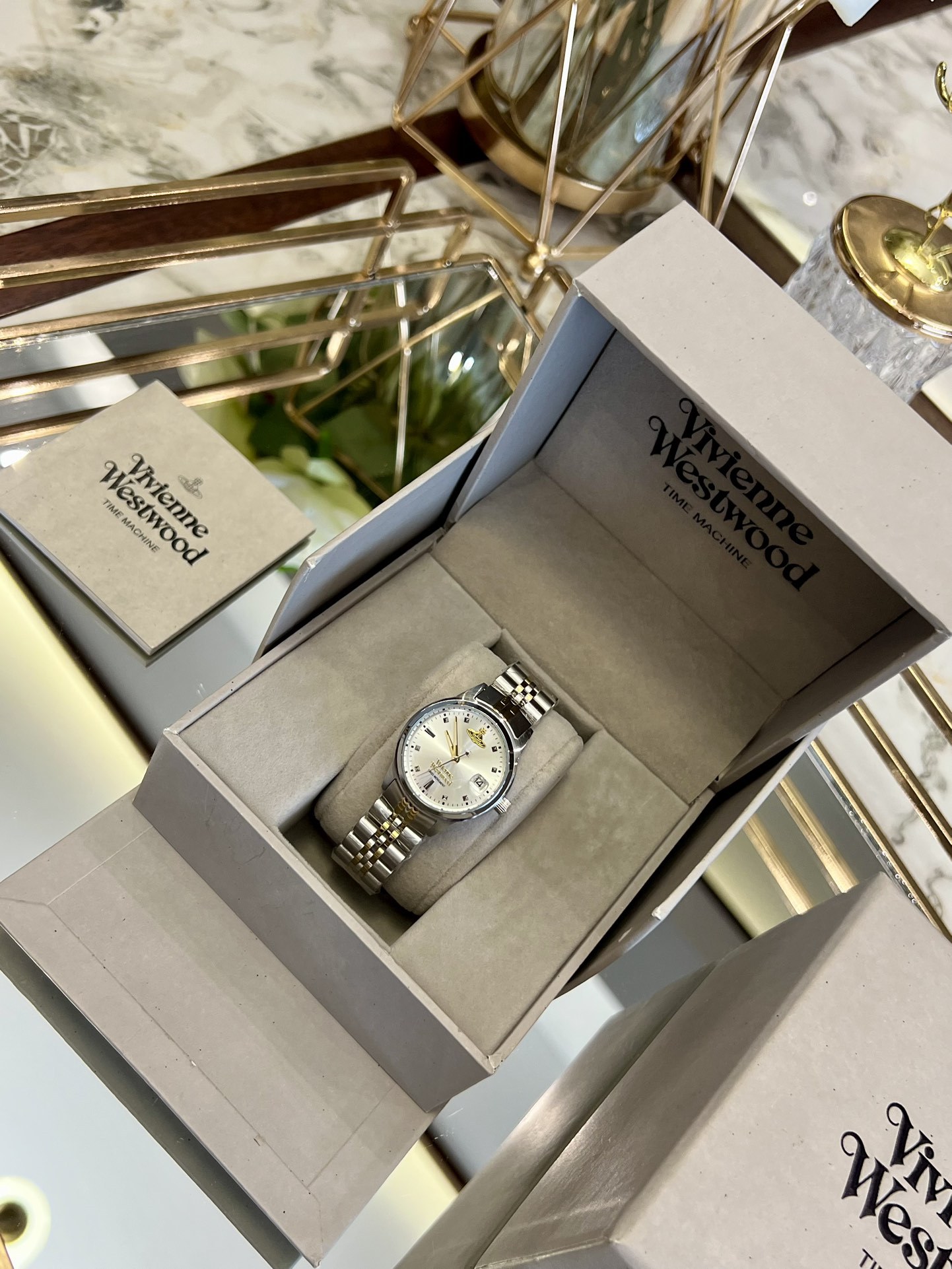 Buy replica Vivienne Westwood Silver Gold Mixed Color Band Watch - 30MM and replica jewelry from PICKS Jewelry
