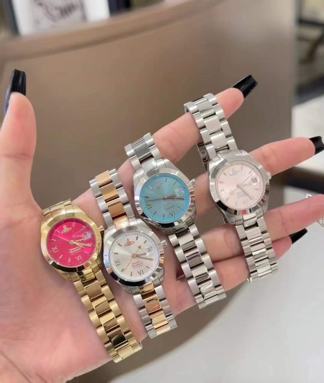 Buy replica Vivienne Westwood Light Blue Dial Silver Band Saturn Watch - 28MM and replica jewelry from PICKS Jewelry
