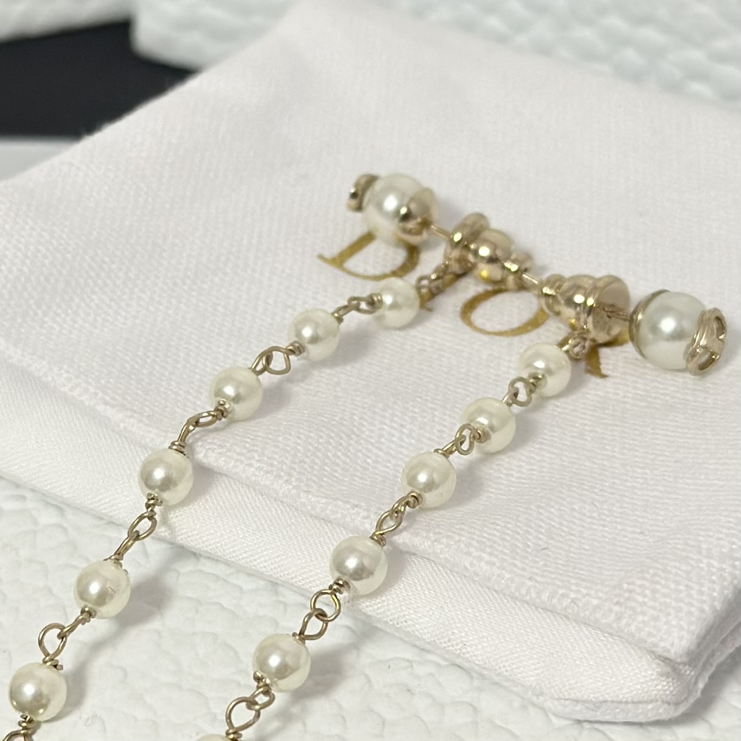 Buy replica Dior Long Tassel Butterfly Dangle Pearl Earrings and replica jewelry from PICKS Jewelry