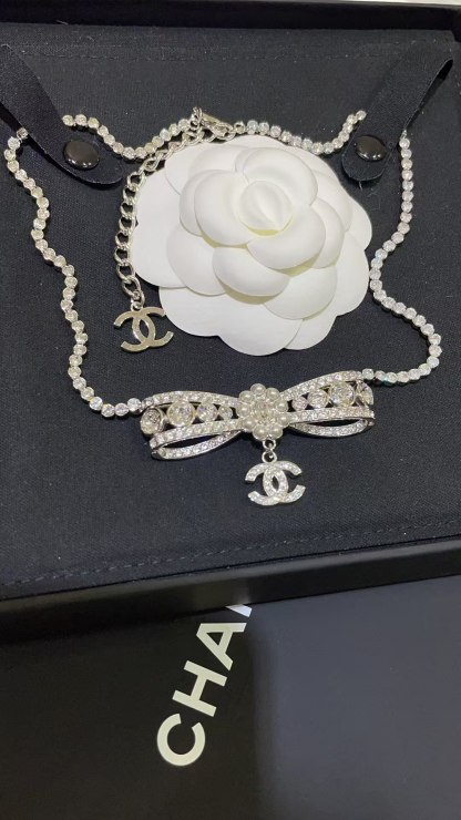 Buy replica Chanel Rhinestone Strass Bowknot Pendant Necklace and replica jewelry from PICKS Jewelry