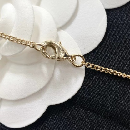 Buy replica Chanel Minimalist Double C Pearl Drop Necklace and replica jewelry from PICKS Jewelry