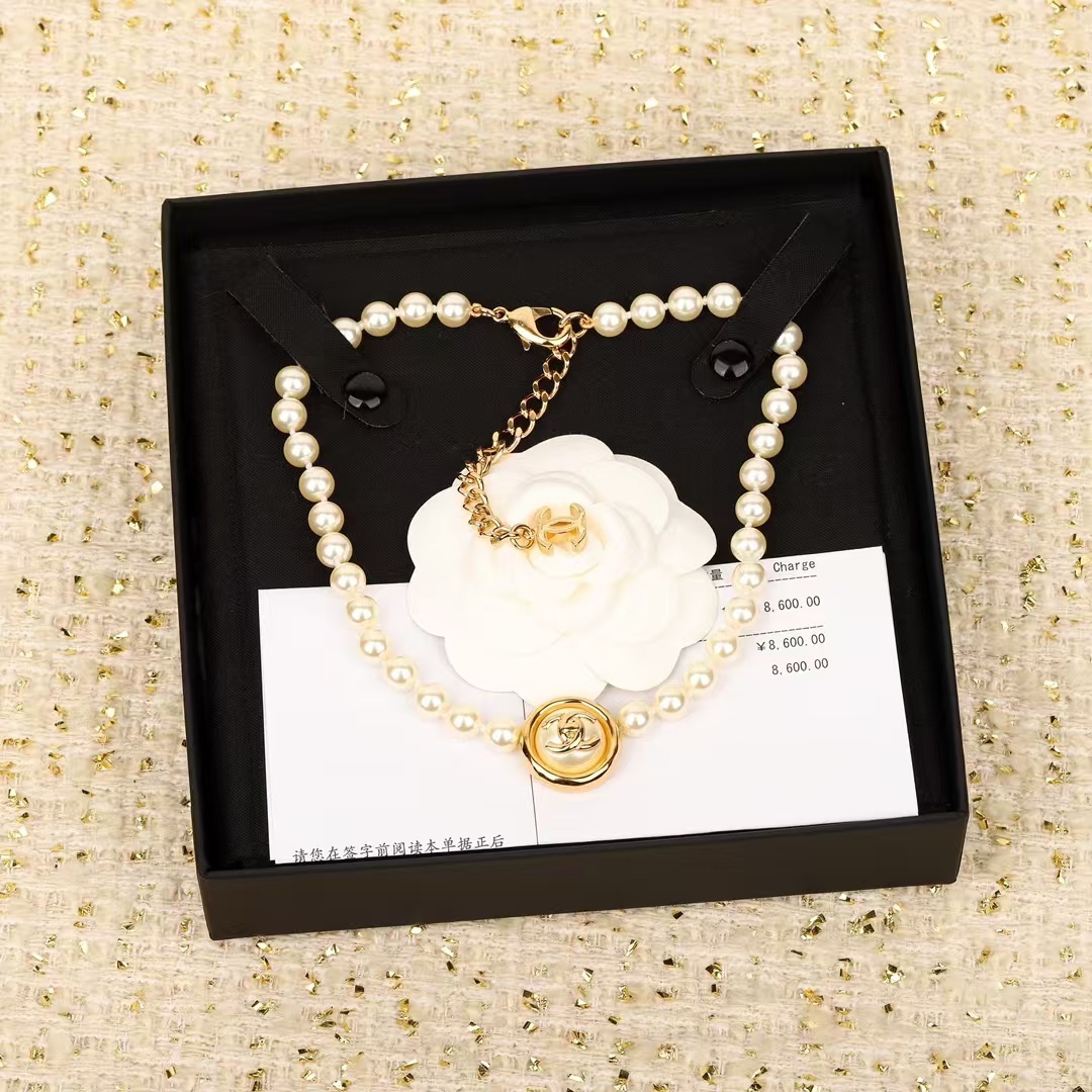 Buy replica Chanel Enhancer Double C Pendant Pearl Choker Necklace and replica jewelry from PICKS Jewelry
