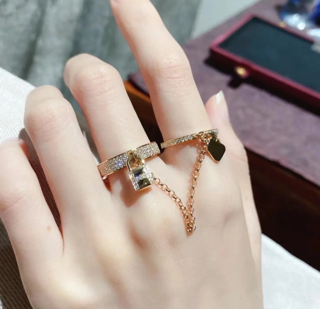 Buy replica Hermes Double Finger Key and Lock Ring and replica jewelry from PICKS Jewelry