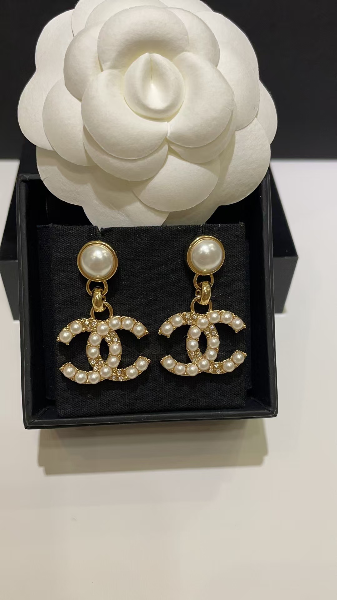 Buy replica Chanel Pearl Paved Double C Earrings and replica jewelry from PICKS Jewelry