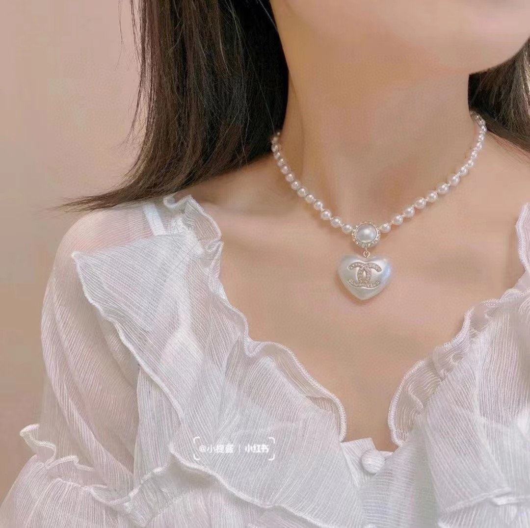 Buy replica Chanel Princess Style Heart Pendant Pearl Necklace and replica jewelry from PICKS Jewelry