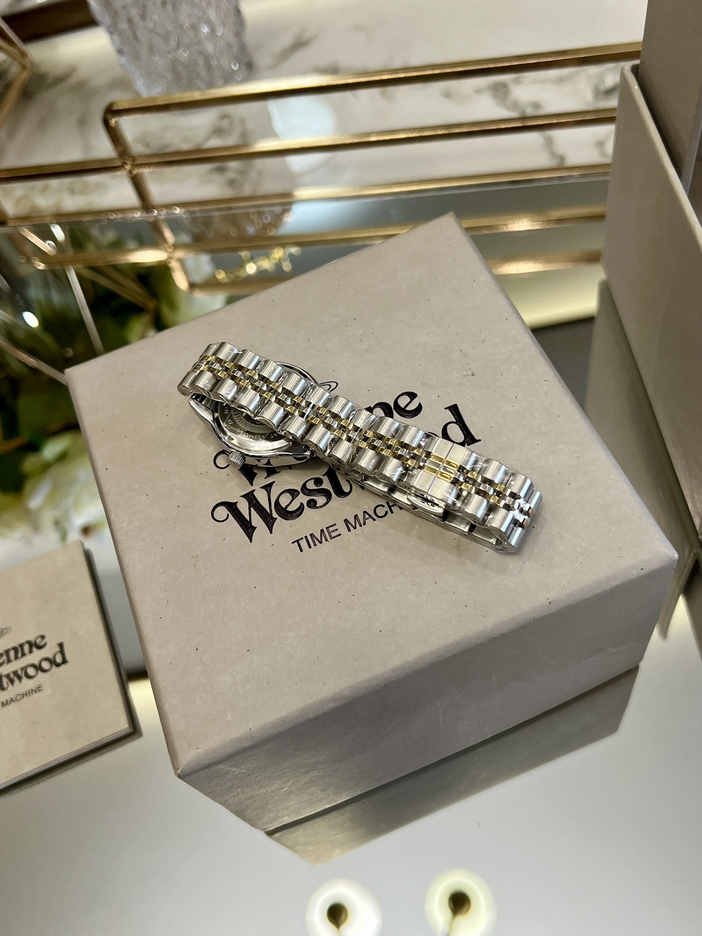 Buy replica Vivienne Westwood Silver Gold Mixed Color Band Watch - 30MM and replica jewelry from PICKS Jewelry