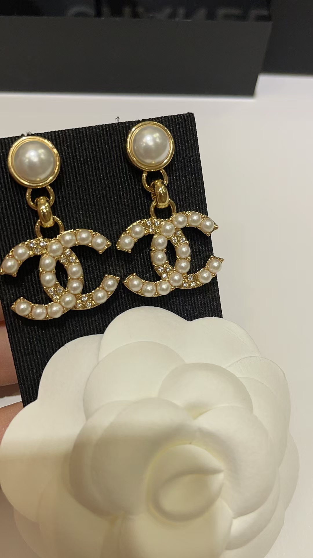 Buy replica Chanel Pearl Paved Double C Earrings and replica jewelry from PICKS Jewelry