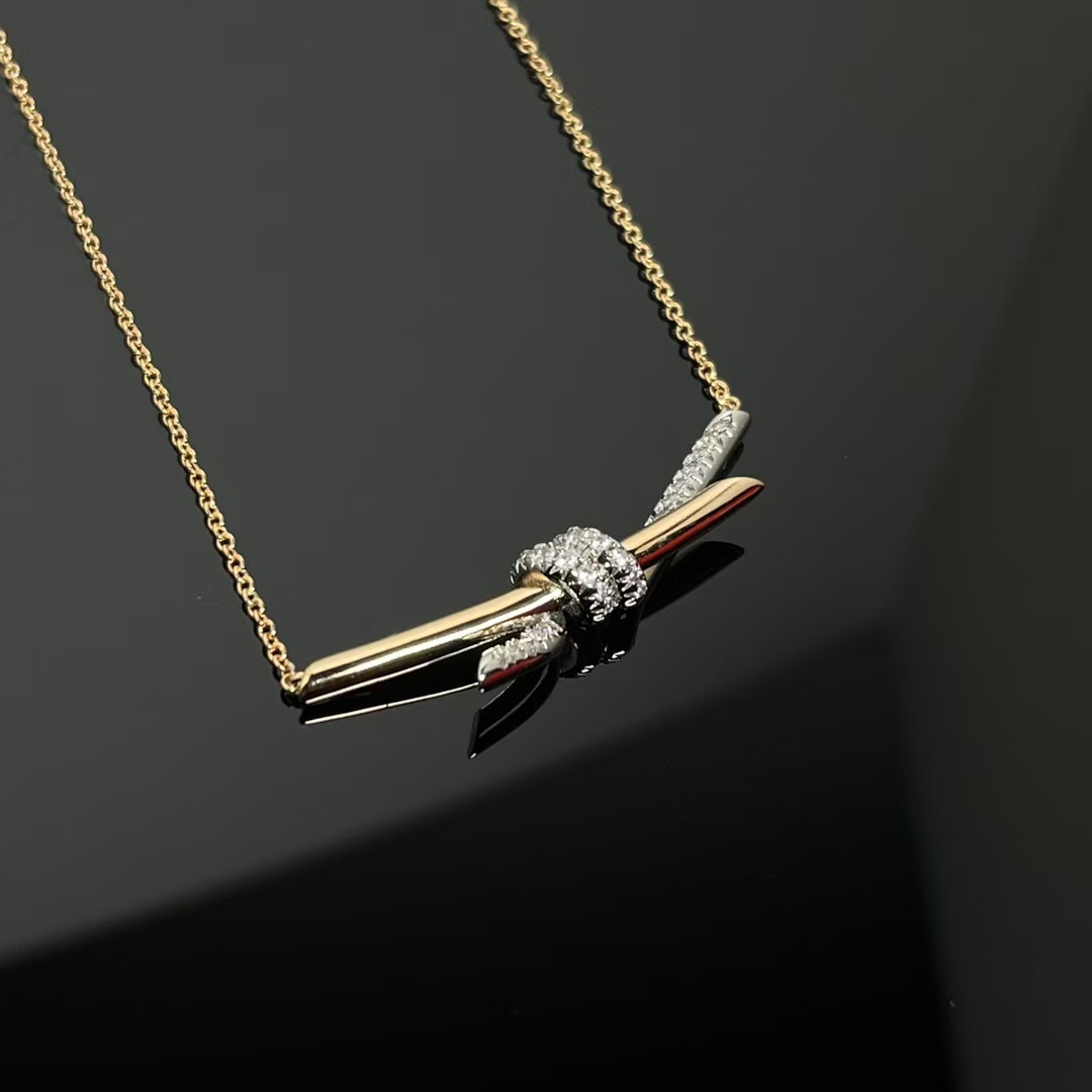 Buy replica Tiffany Knot Pendant Necklace - Mixed Metal Color and replica jewelry from PICKS Jewelry