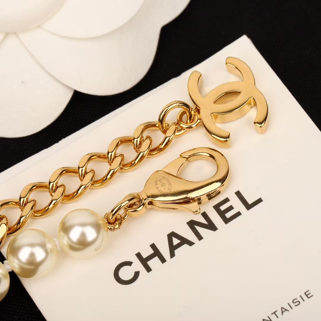 Buy replica Chanel Enhancer Double C Pendant Pearl Choker Necklace and replica jewelry from PICKS Jewelry