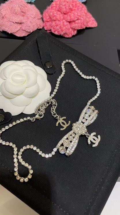 Buy replica Chanel Rhinestone Strass Bowknot Pendant Necklace and replica jewelry from PICKS Jewelry