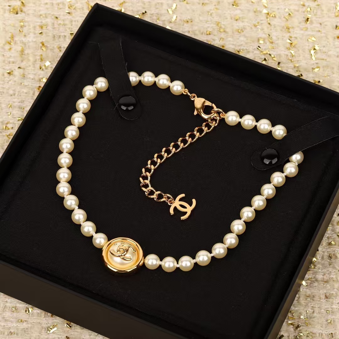Buy replica Chanel Enhancer Double C Pendant Pearl Choker Necklace and replica jewelry from PICKS Jewelry