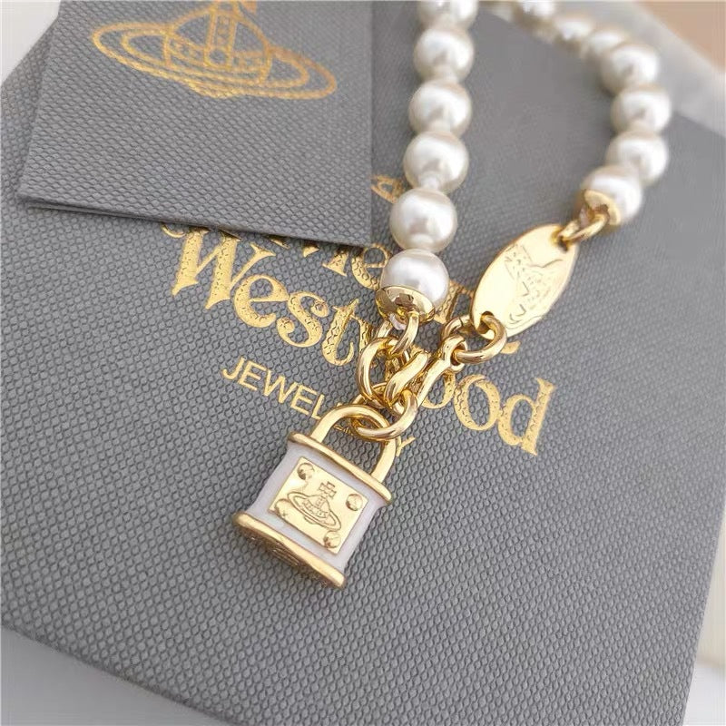 Buy replica Vivienne Westwood Lock Charm Pearl Bracelet and replica jewelry from PICKS Jewelry