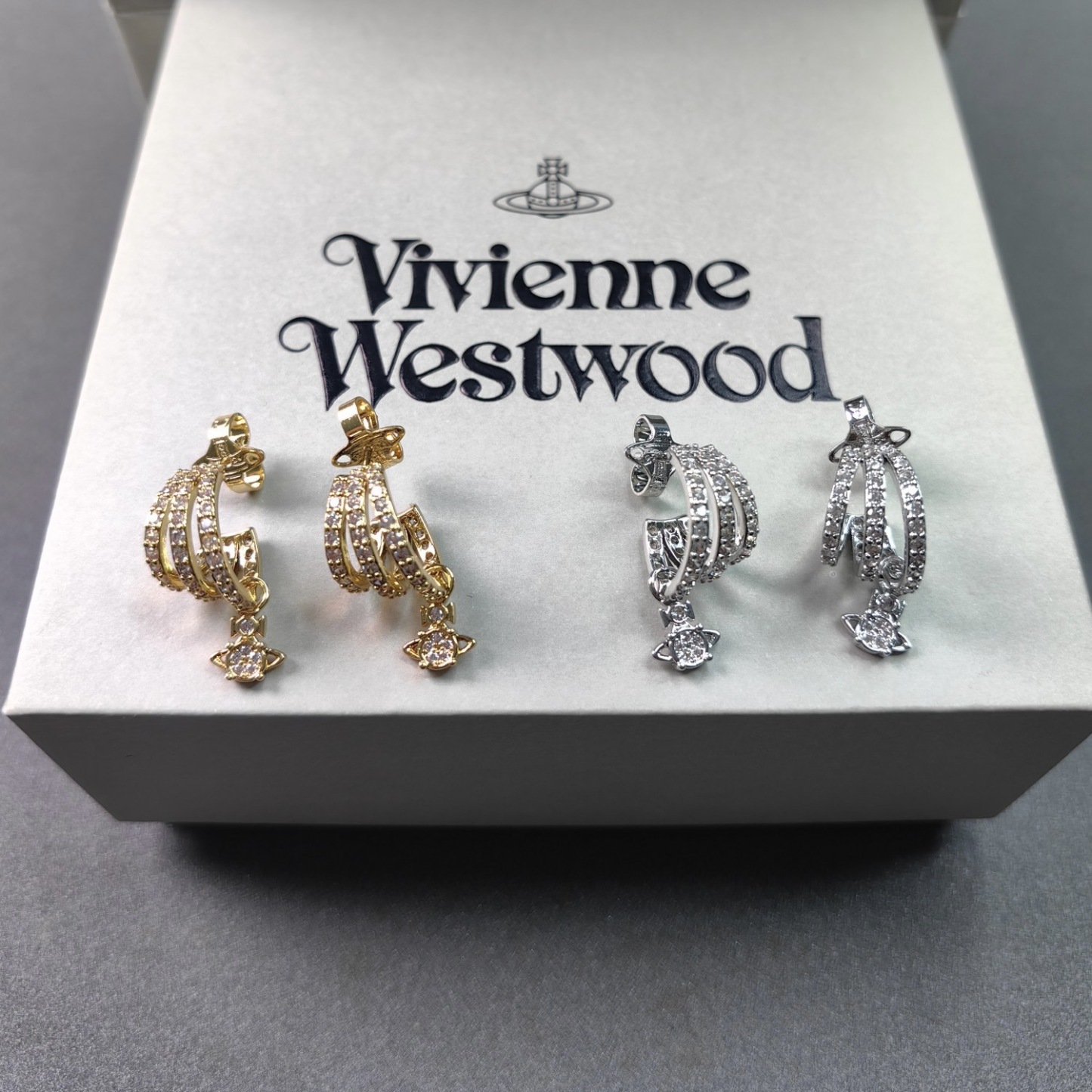 Buy replica Vivienne Westwood C Shape Saturn Drop Earrings and replica jewelry from PICKS Jewelry