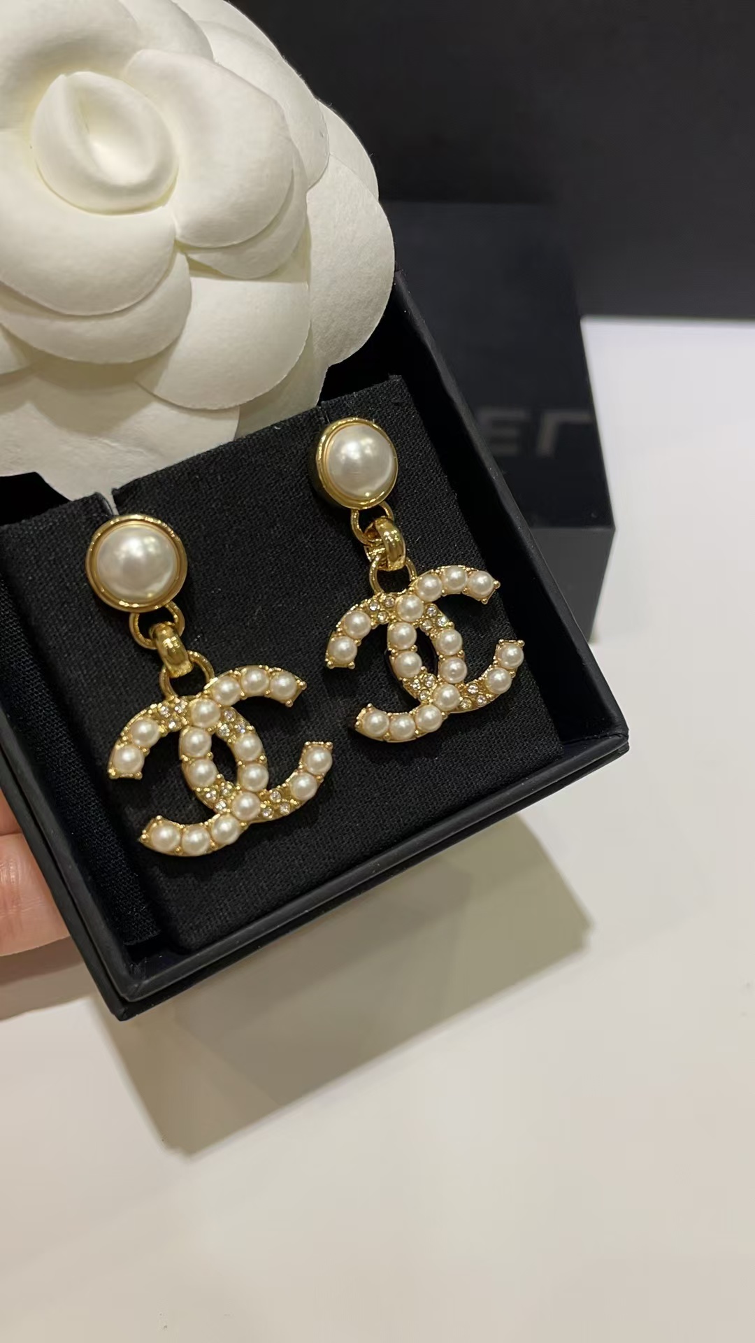 Buy replica Chanel Pearl Paved Double C Earrings and replica jewelry from PICKS Jewelry