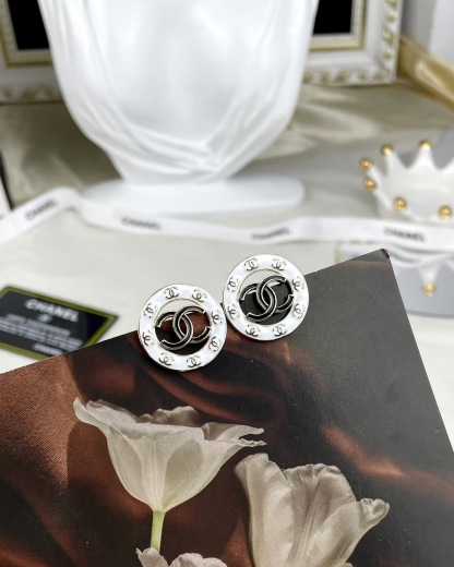 Buy replica Chanel Round White and Black Enamel Stud Earrings and replica jewelry from PICKS Jewelry