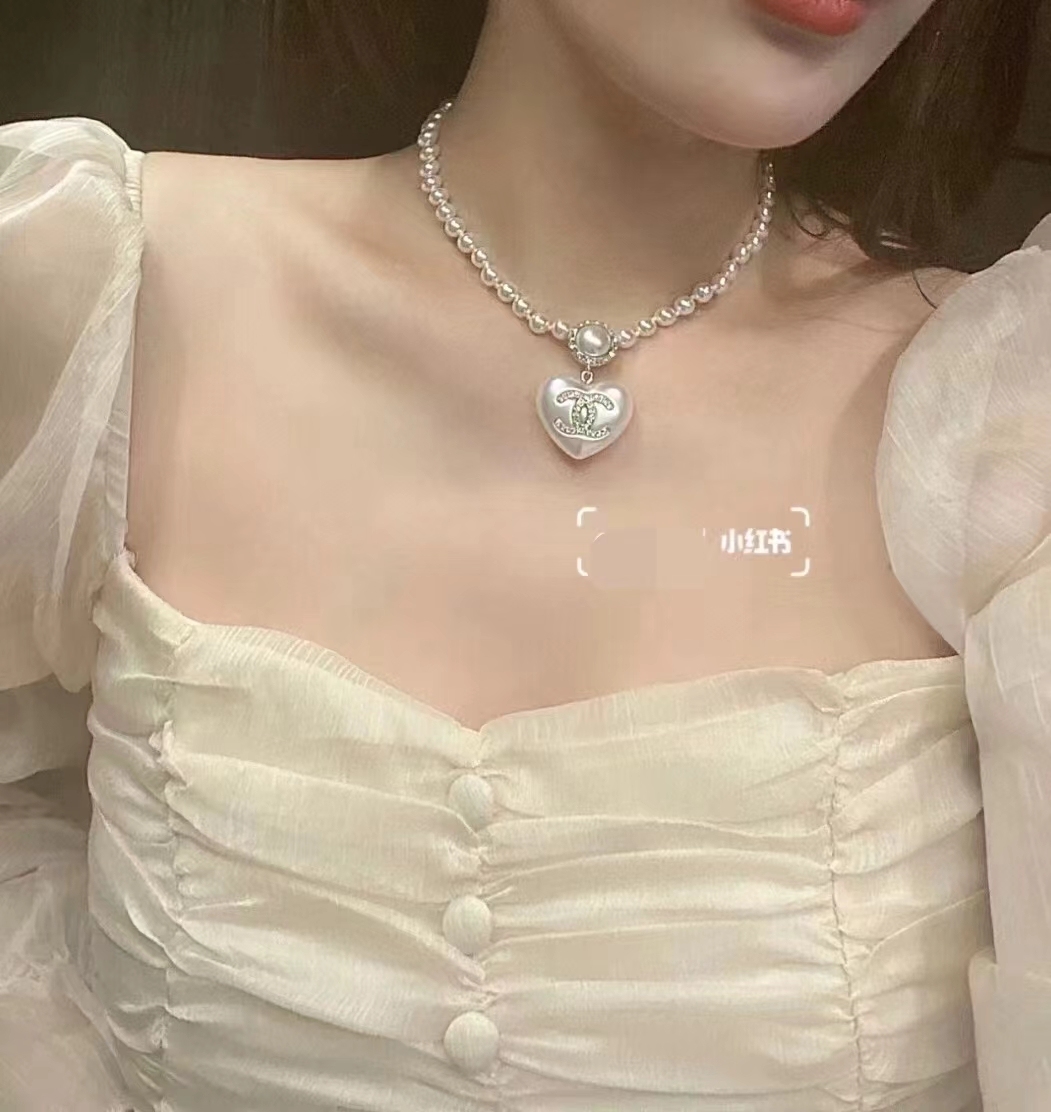 Buy replica Chanel Princess Style Heart Pendant Pearl Necklace and replica jewelry from PICKS Jewelry