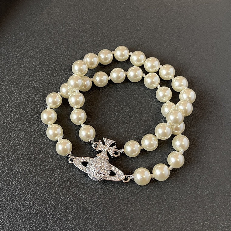 Buy replica Vivienne Westwood 2 Row Pearl Bracelet and replica jewelry from PICKS Jewelry